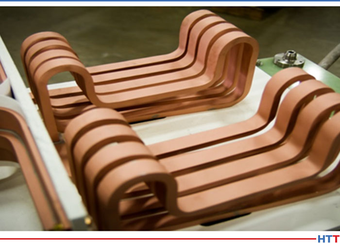 Figure 1. Two in-line multiturn solenoid inductor of a complex shape. (Courtesy of Inductoheat Inc., an Inductotherm Group company)
