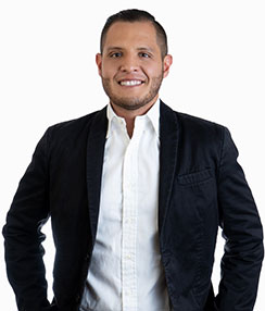 Smiling young man in a black sport coat
