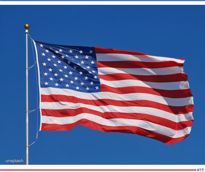 American flag on a bright blue sky