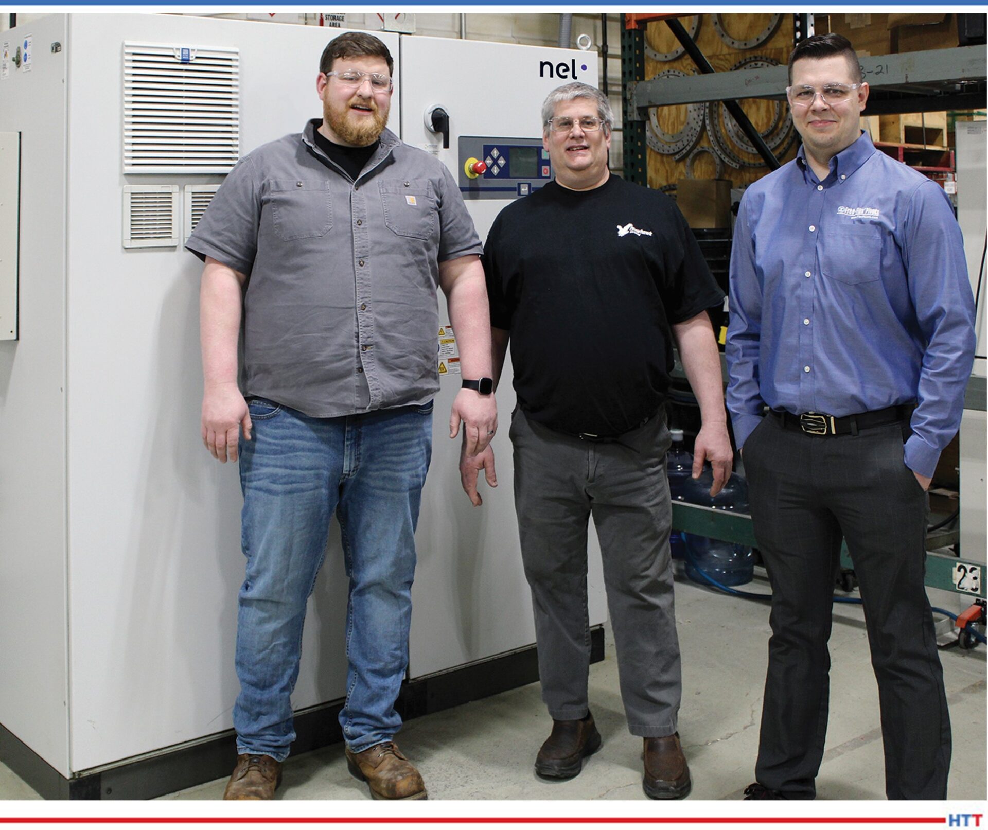 A group of three smiling men