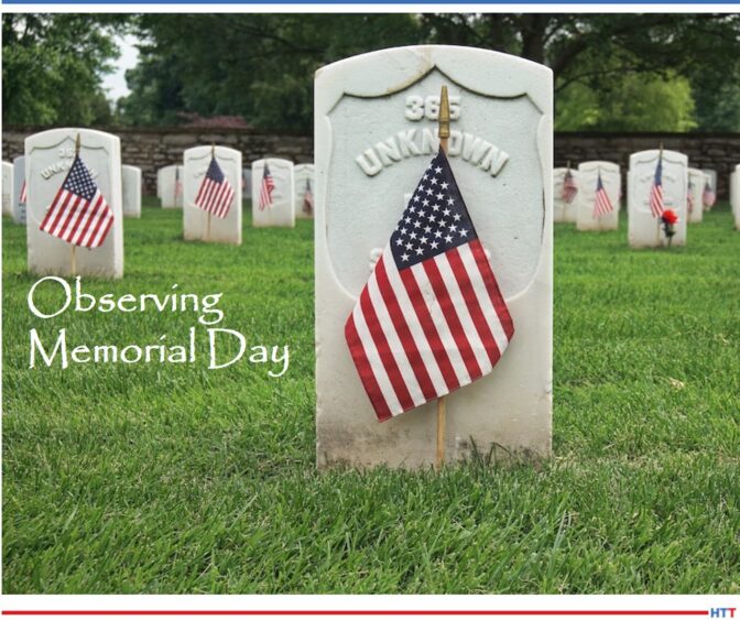 An American flag and a gravestone for an unknown soldier