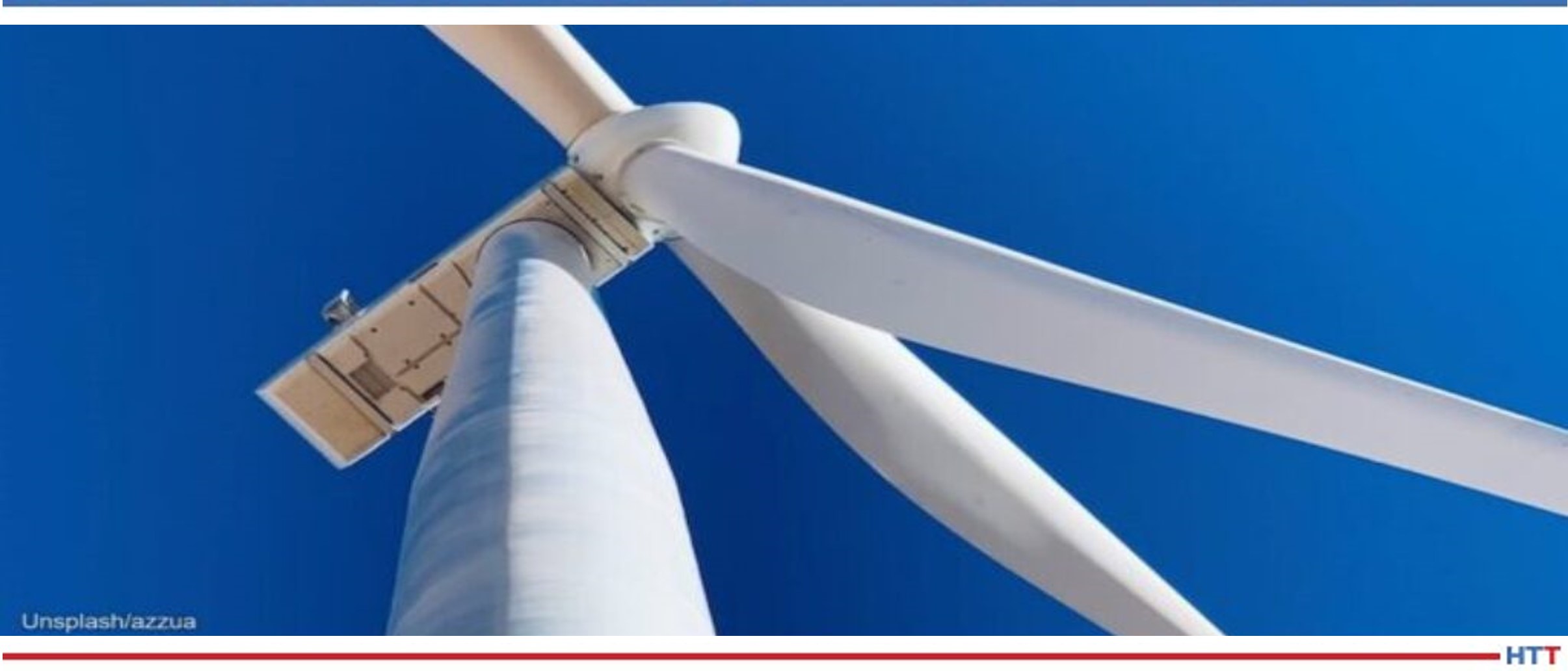 Wind turbine against a blue sky