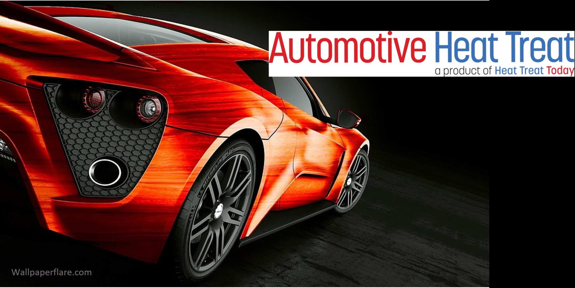 Red car with Automotive Heat Treat banner