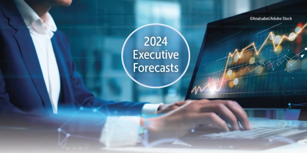 Man typing at a computer with the words 2024 Executive Forecasts